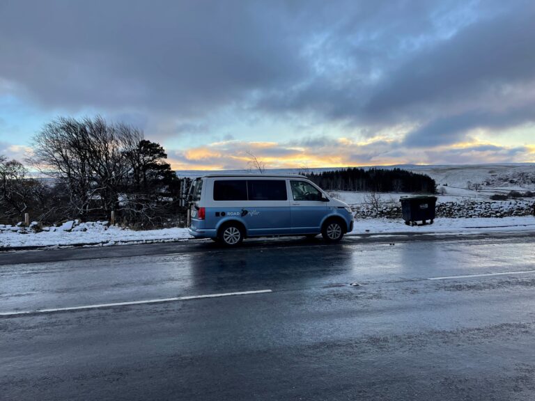 roadrifter vw campervan on a snowy road.